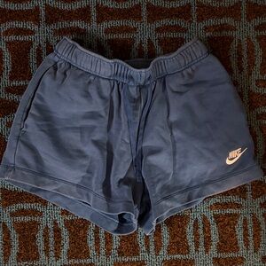 Nike Women's Athletic Shorts in Blue with Pink Logo